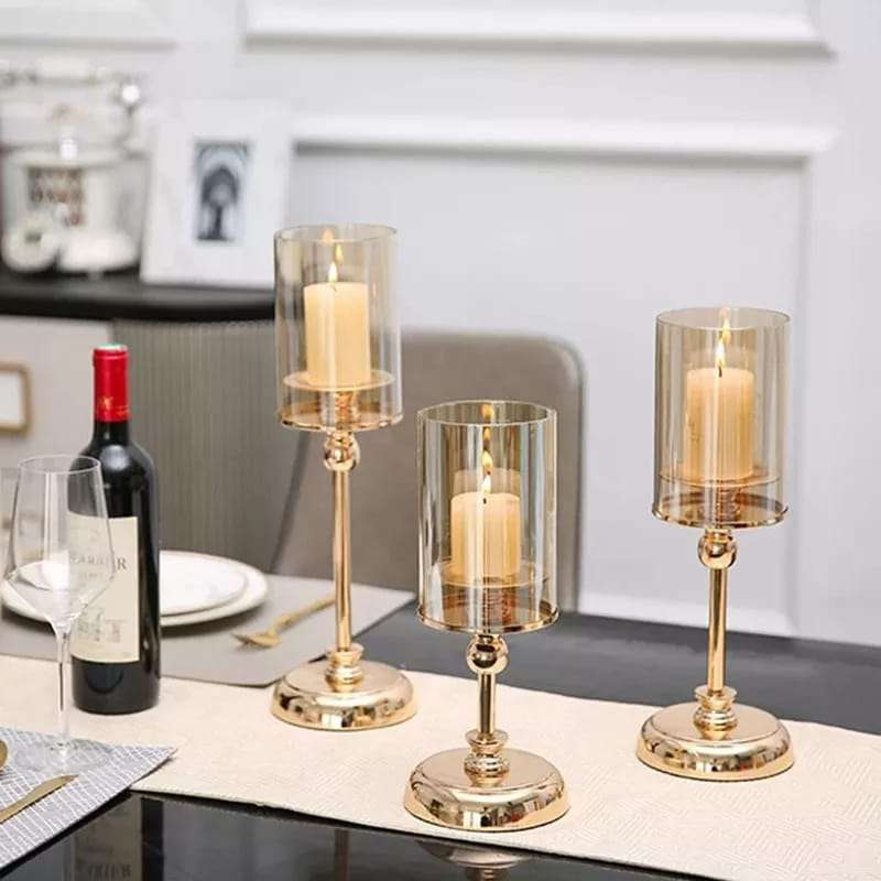 Set of three metallic candle holder